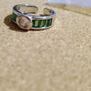 Stunning Silver Ring with Green Accents